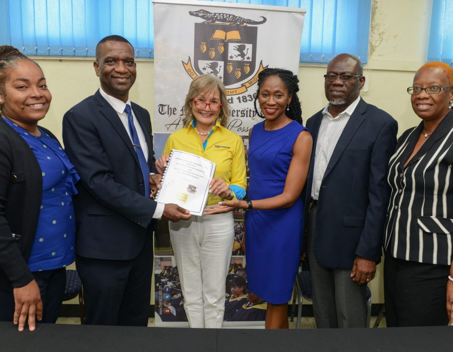 Left to right. Jamilia Crooks, NCB Foundation, Dr. Asburn Pinnock, President of the Mico University College, Mrs. Thalia Lyn, Chairperson of the NCB Foundation Mrs. Nadeen Matthew's Blair, CEO of NCB Foundation, Mr. Burchell Duhaney, Secretary Manager The Mico Foundation, Mrs. Sharon Heslop Brown , Project Coordinator The Mico Foundation.